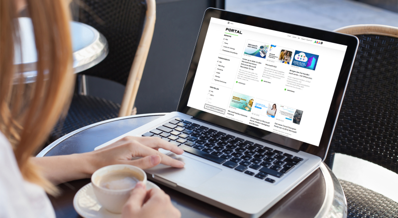 Image of a person checking out the Deals & Discoveries portal on their laptop