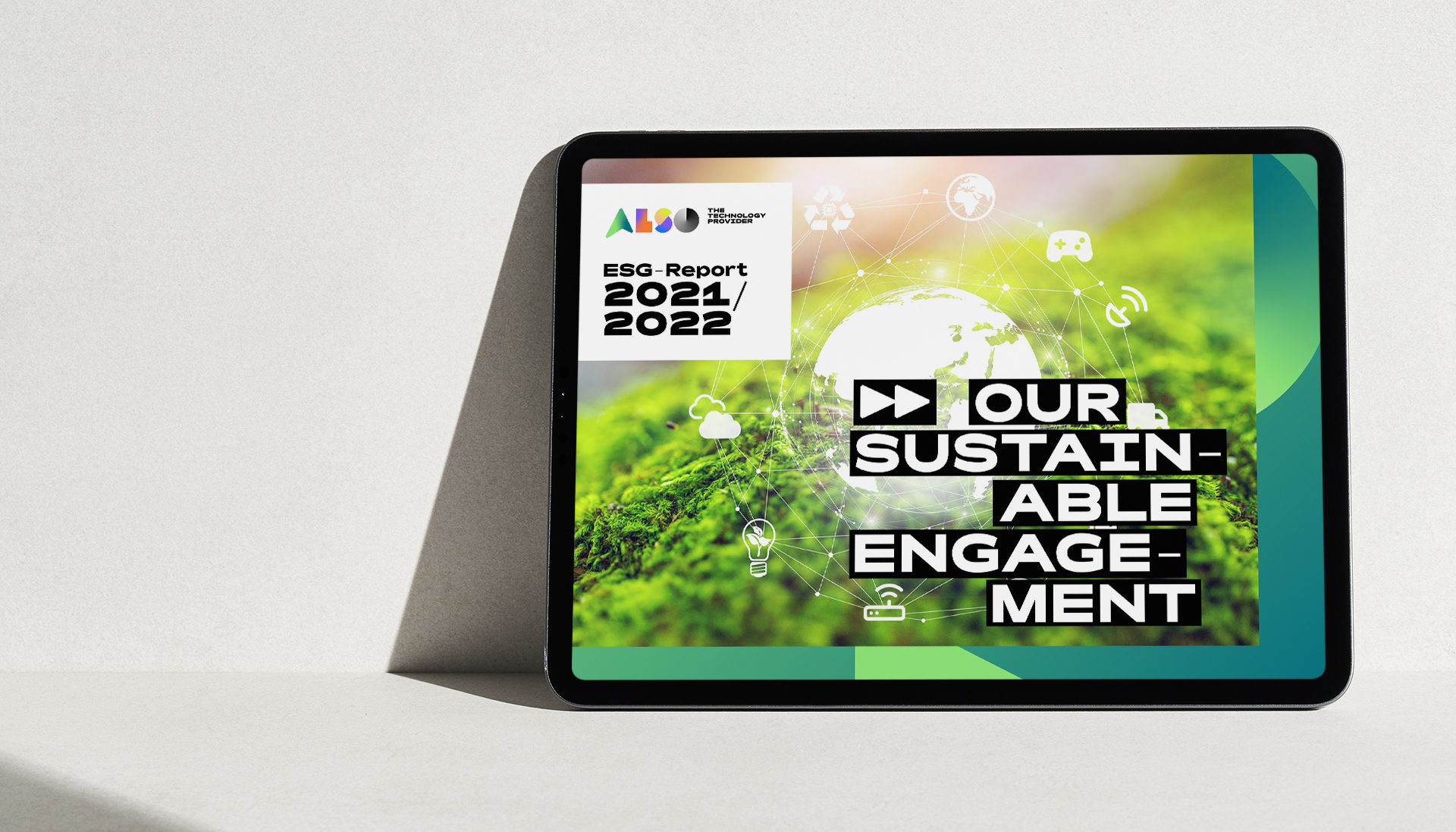 The ESG report cover displayed on a tablet